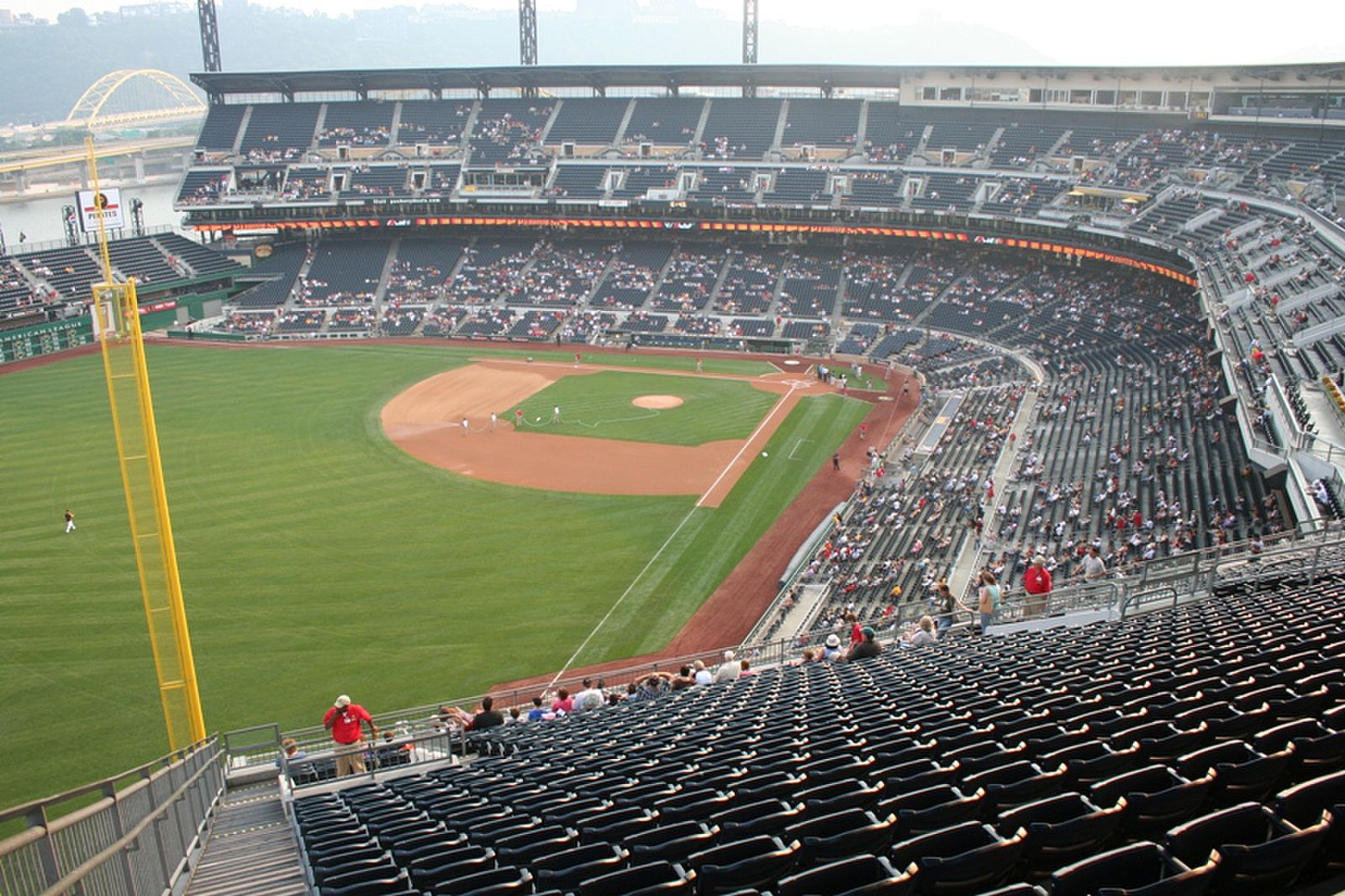 This is taken from the last row of the upper deck near the left field foul pole.  You can see the Pittsburgh skyline and the Allegheny River beyond the stadium.